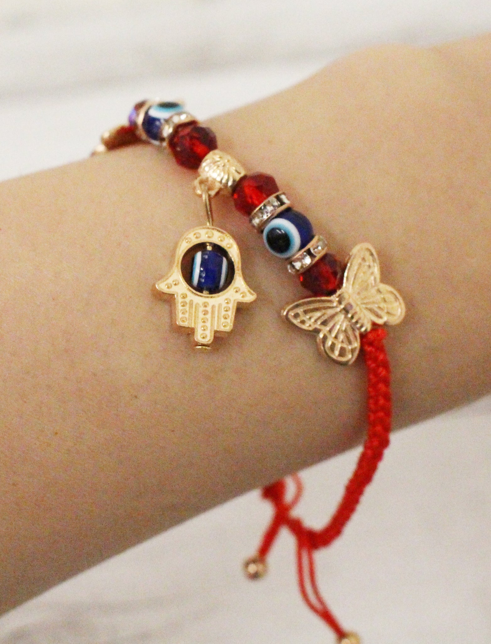 Evil eye hand on sale bracelet