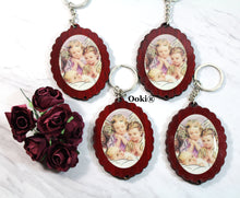 Load image into Gallery viewer, 12 Angels Watching Baby Wood Keychain